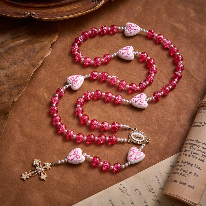 Christianartworkshop Rosa Rosenkranz aus Crackle-Glas mit Keramikherz-Schleifenperlen und Marienmedaille - Rosa - image 0