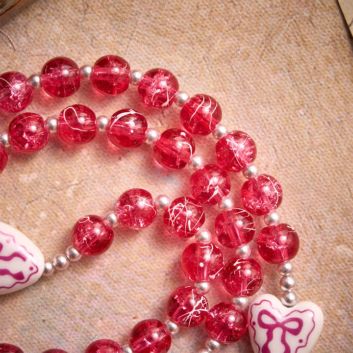 Christianartworkshop Rosa Rosenkranz aus Crackle-Glas mit Keramikherz-Schleifenperlen und Marienmedaille - image 8