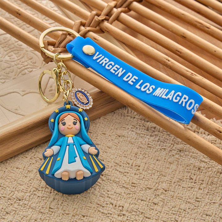 Christianartworkshop Niedlicher Schlüsselanhänger aus Kunstharz mit heiliger Cartoon-Figur: Symbol himmlischer Fürsorge - Unsere Liebe Frau der Wunder - image 5