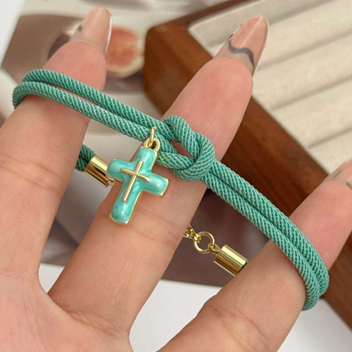 Christianartworkshop Armband mit Kreuzanhänger aus weich geknoteter Kordel: Symbol sanften, himmlischen Trostes - Hellgrün - image 3