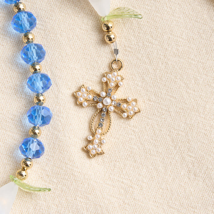 Christianartworkshop Durchscheinender blauer Rosenkranz aus Glas mit Lilienmotiv und perlenbesetztem Kreuz: Sinnbild reiner himmlischer Gelassenheit - image 7