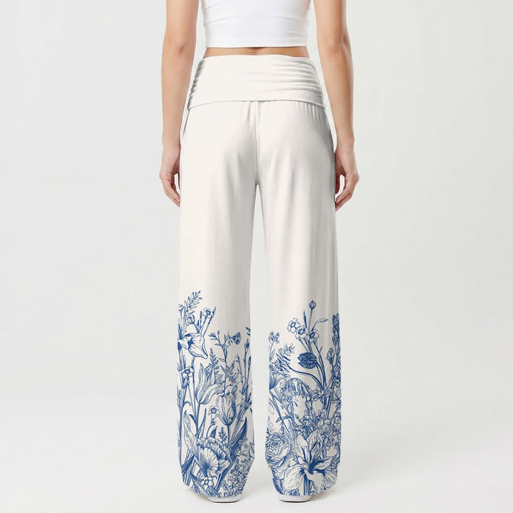 Christianartworkshop Blaue Damenhose mit Blumenmuster und umgeschlagenem Saum von YHWH mit weitem Bein - image 1