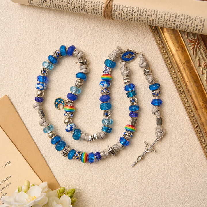Christianartworkshop Handgefertigter Rosenkranz aus hellblauen Mischperlen: Sinnbild sanfter himmlischer Gnade - Blau getönter Rosenkranz - image 0