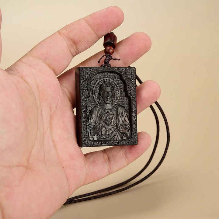Christianartworkshop Gerahmter Relief-Anhänger aus Holz mit Jesusmotiv: Gefäß zeitloser, heiliger Gnade - Afrikanisches Ebenholz - image 3