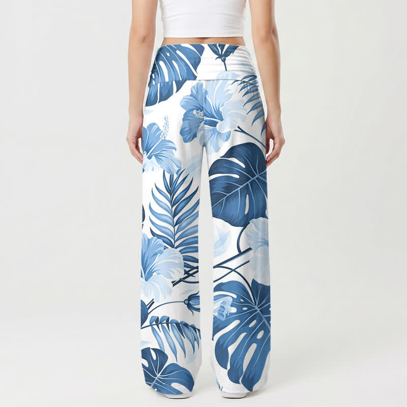 Christianartworkshop Blaue Damenhose mit tropischem Blumenmuster, hohem Bund und weitem Bein, mit weitem Bein und hohem Bund. - image 1