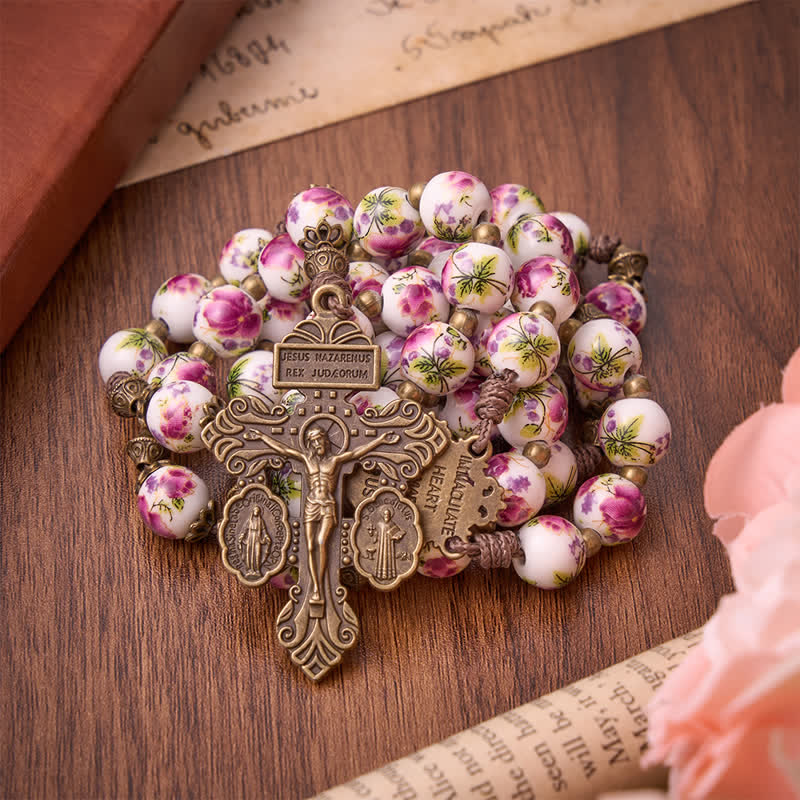 Christianartworkshop Rosenkranz aus antikisiertem Bronze mit rosa Blütenmotiv, Marienmedaille und Kruzifix - Rosenkranz aus rosa Porzellan mit Blumenmuster - image 0