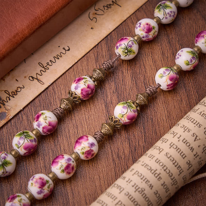 Christianartworkshop Rosenkranz aus antikisiertem Bronze mit rosa Blütenmotiv, Marienmedaille und Kruzifix - image 7
