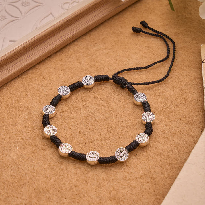 Christianartworkshop Armband mit Medaillon aus tiefschwarzer Kordel und St.-Benedikt-Legierung: Zeichen entschlossenen, heiligen Schutzes - Der heilige Benedikt - image 0