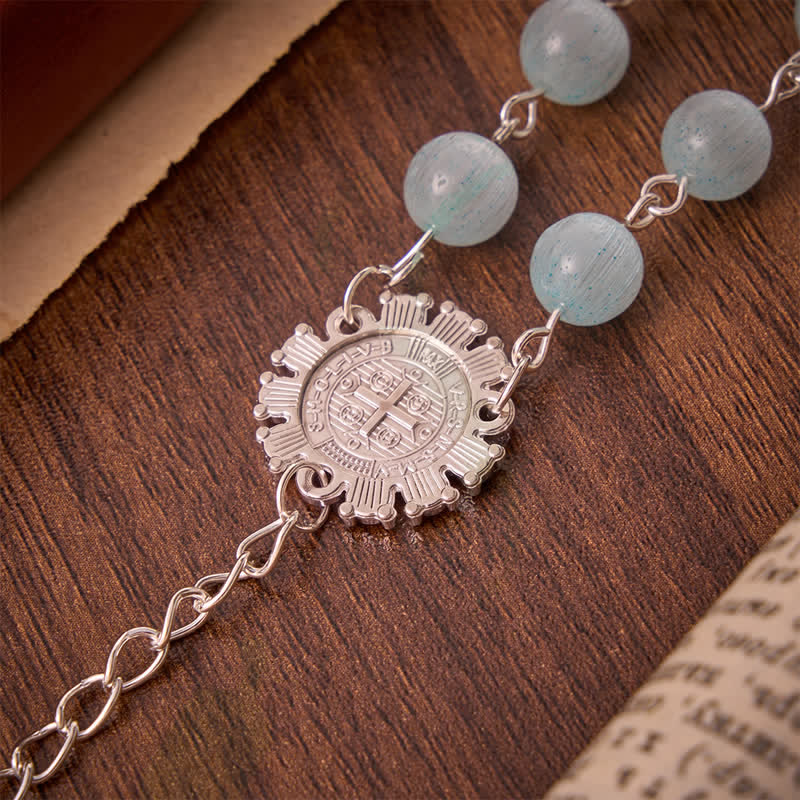 Christianartworkshop Hellblauer Rosenkranz in Katzenaugenform mit St.-Benedikt-Medaille und weißem Emaille-Kruzifix - image 7
