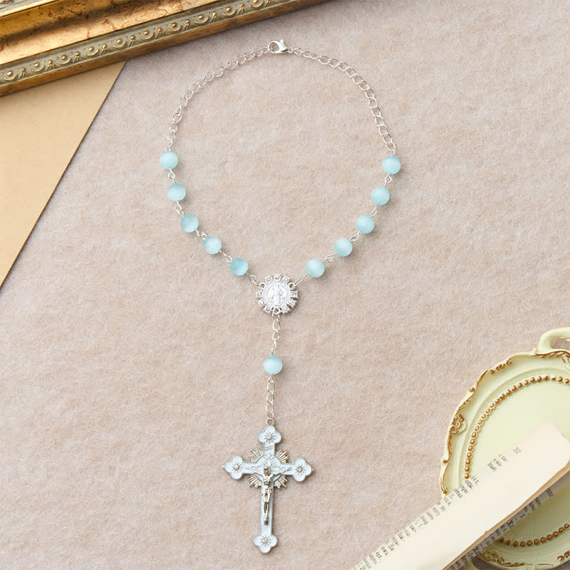 Christianartworkshop Hellblauer Rosenkranz in Katzenaugenform mit St.-Benedikt-Medaille und weißem Emaille-Kruzifix - image 3
