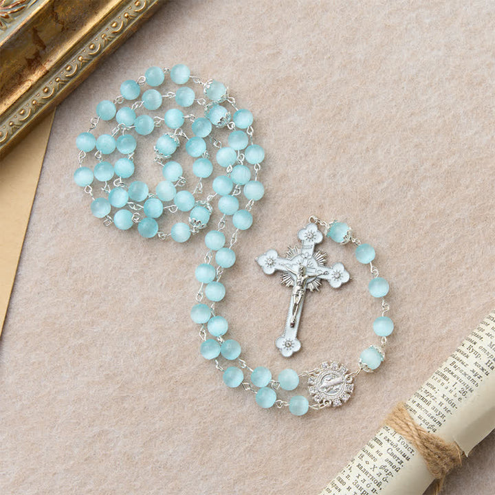 Christianartworkshop Rosenkranz mit Katzenaugenperlen in Hellblau & St.-Benedikt-Kreuz: Symbol stiller, heiliger Führung - image 4