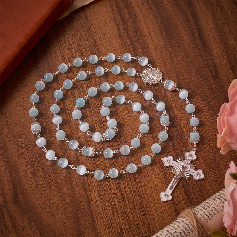 Christianartworkshop Rosenkranz mit Katzenaugenperlen in Hellblau & St.-Benedikt-Kreuz: Symbol stiller, heiliger Führung - Rosenkranz mit hellblauen Katzenaugen - image 0