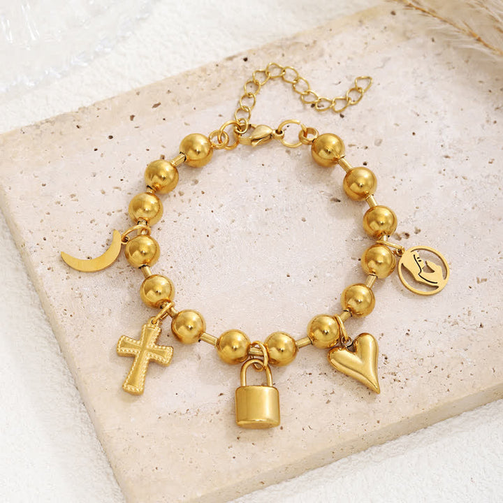 Christianartworkshop Mehrreihiges Perlenkreuz-Armband: Zeichen zärtlicher himmlischer Hingabe - Golden - image 0